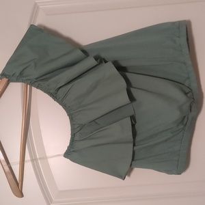 A new day. One shoulder tank top